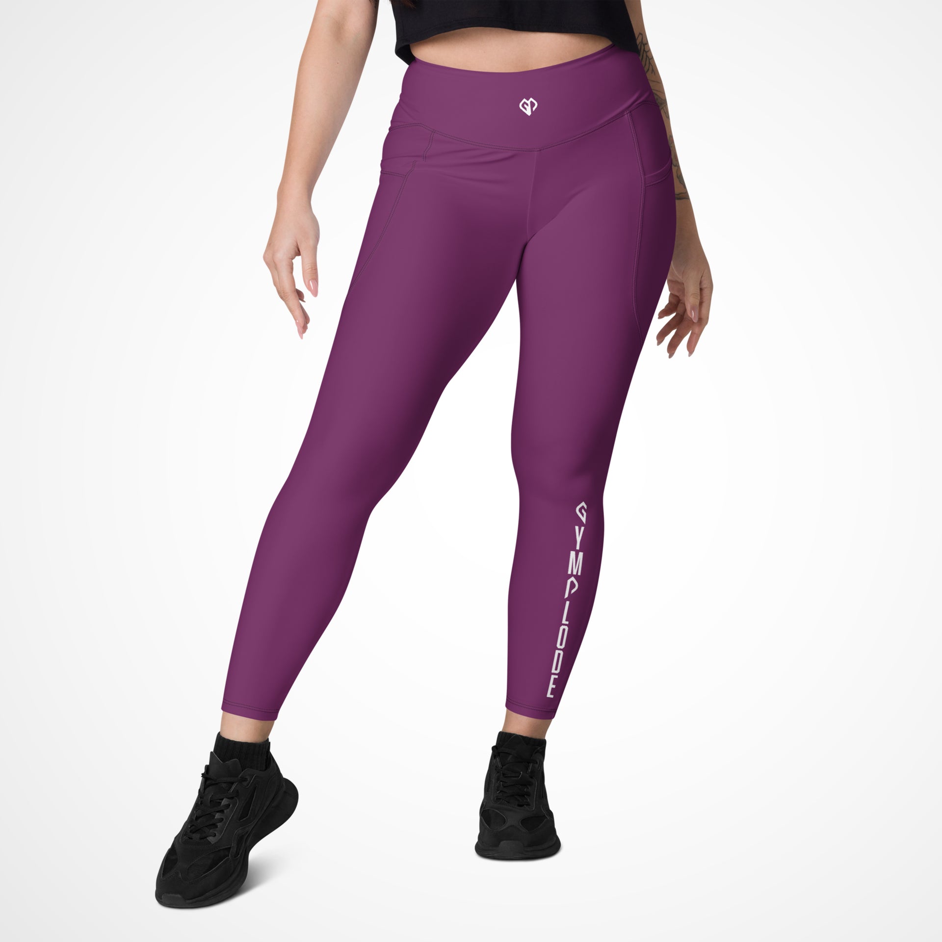 Activewear coming soon purple Gymplode leggings with white female model