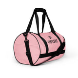 Baby pink rounded end Gymplode duffle bag with dual mark, right front view