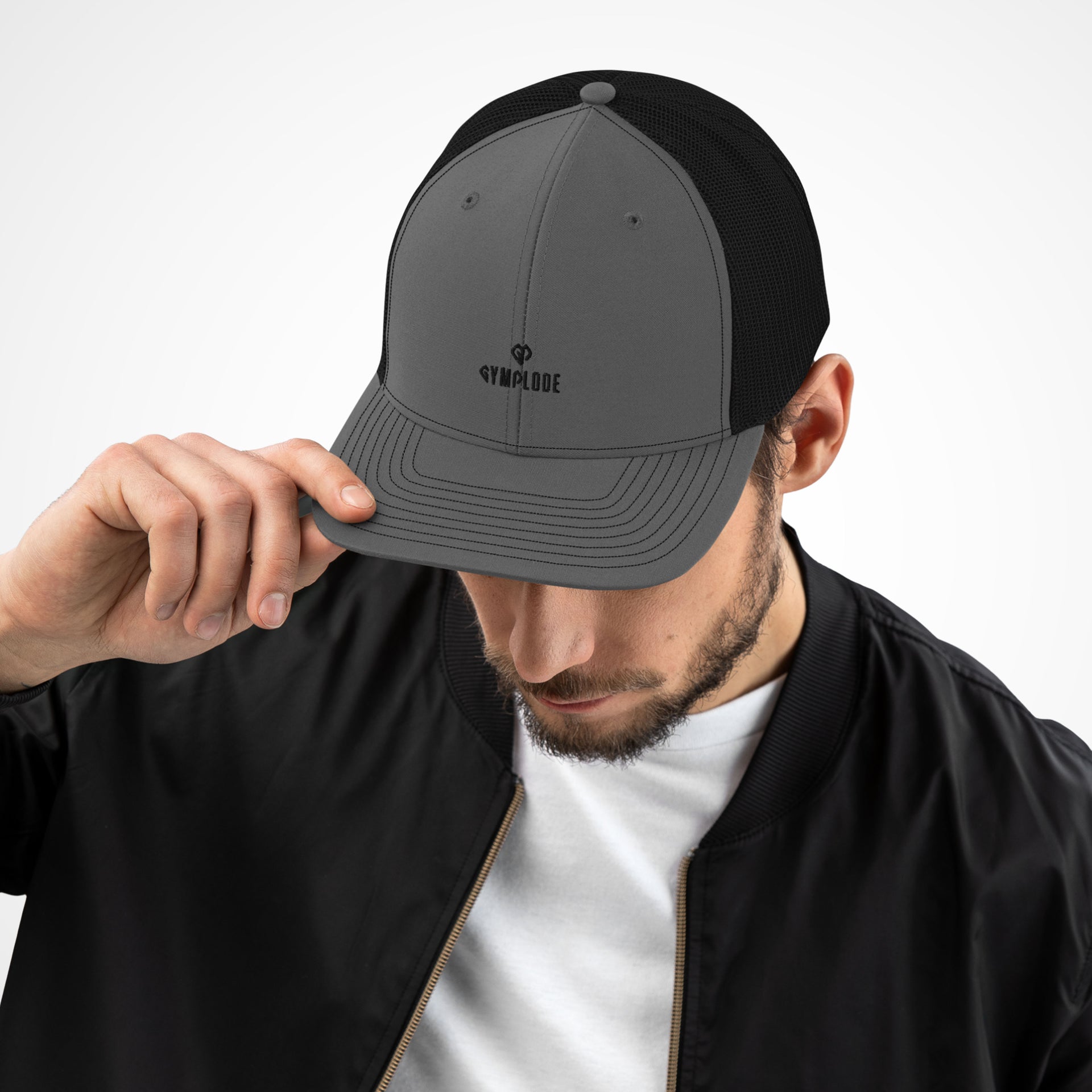 Black and grey coming soon Gymplode cap with white male model