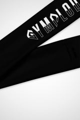 Close-up view of Gymplode signature logo on black headband