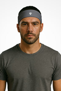 Carbon grey Gymplode headband with icon logo, worn by male model