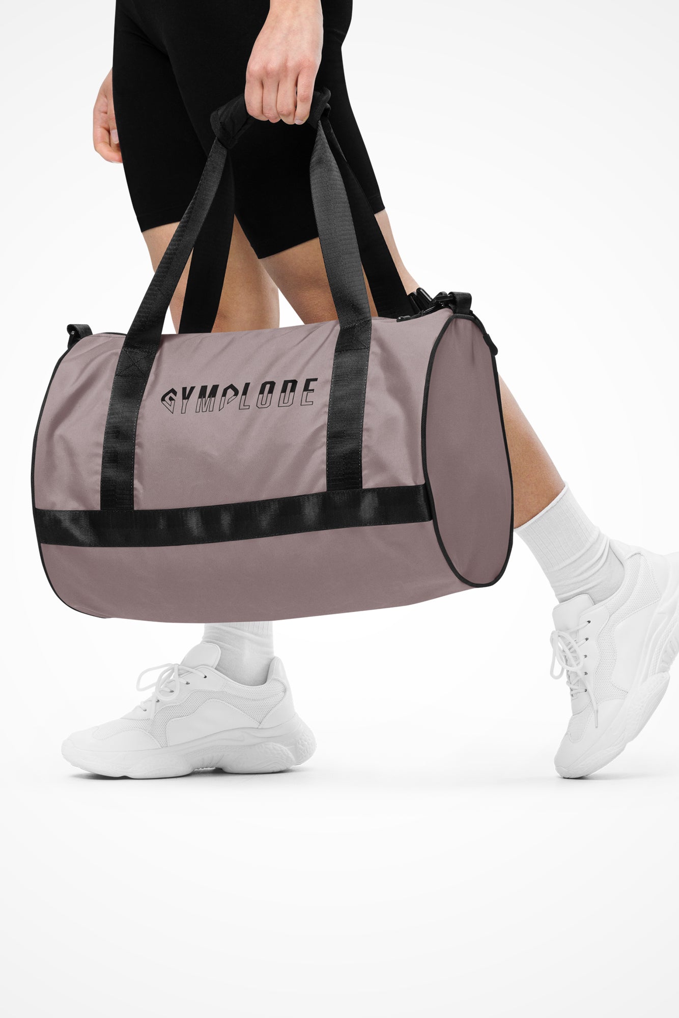 Careys pink rounded end Gymplode duffle bag with signature logo, front view with model