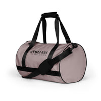 Careys pink rounded end Gymplode duffle bag with signature logo, left front view