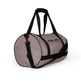 Careys pink rounded end Gymplode duffle bag with signature logo, right front view