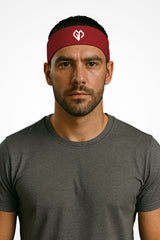 Cherry red Gymplode headband with icon logo, worn by male model