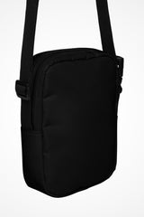Deep black Gymplode slingback utility bag with no print, back view