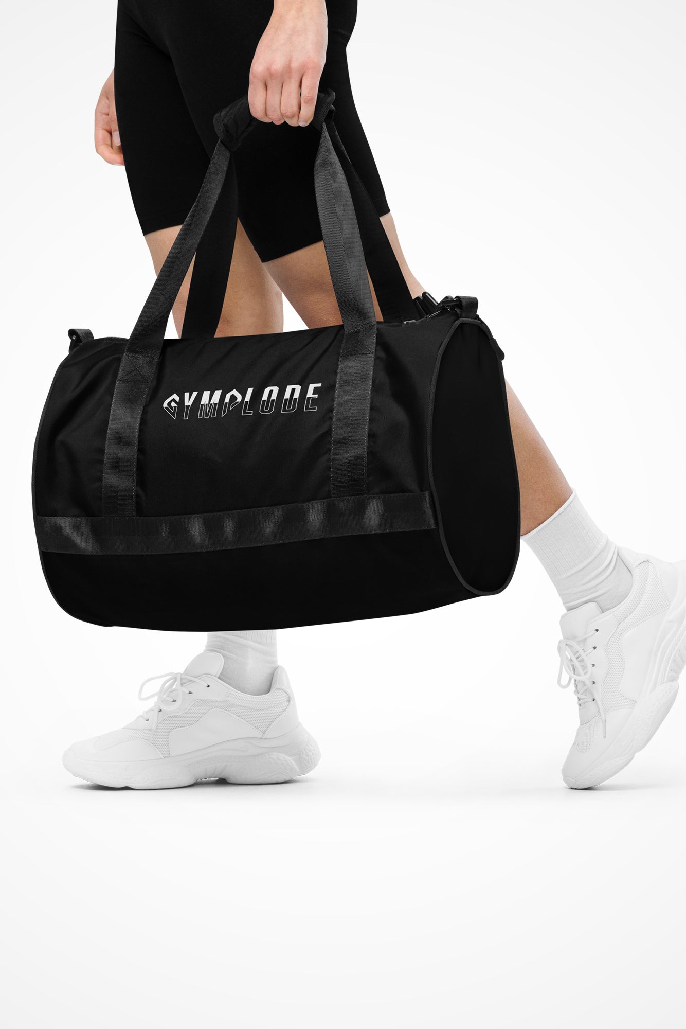 Deep black rounded end Gymplode duffle bag with signature logo, front view with model