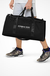 Deep black square end Gymplode duffle bag with signature logo, front view with model