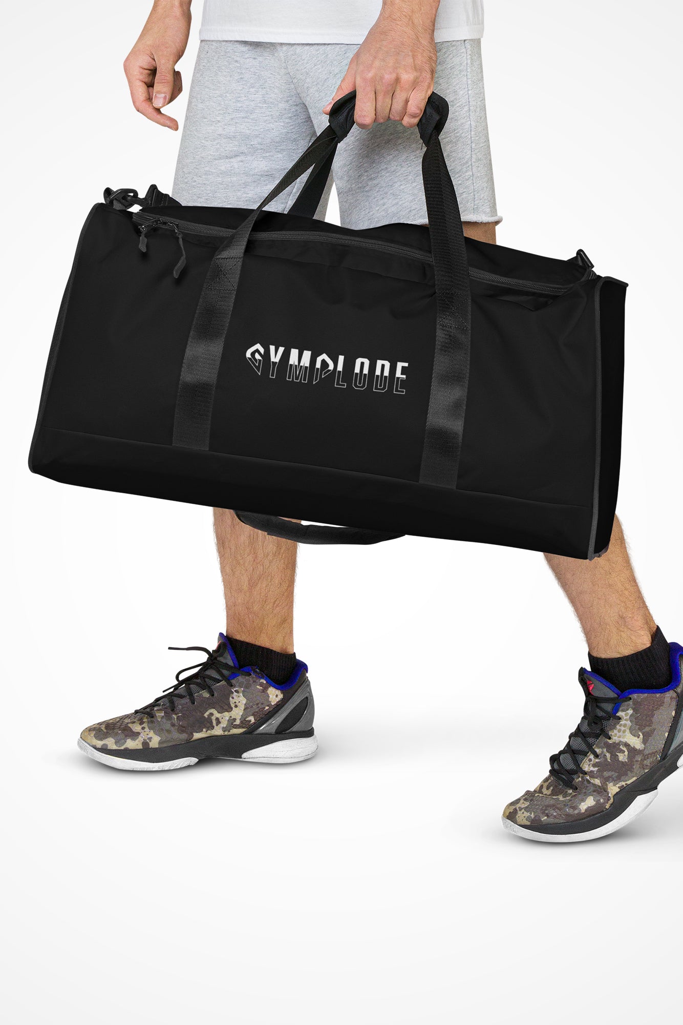 Deep black square end Gymplode duffle bag with signature logo, front view with model