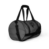 Dusky grey rounded end Gymplode duffle bag with icon logo, right front view