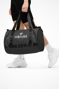 Eclipse grey rounded end Gymplode duffle bag with dual mark, front view with model