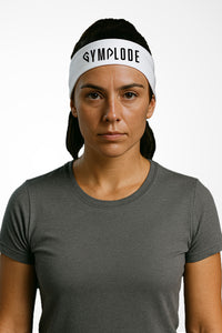 Glacier white Gymplode headband with signature logo, worn by female model
