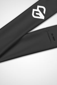 Close-up view of Gymplode icon logo on graphite headband