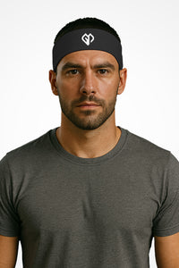 Graphite Gymplode headband with icon logo, worn by male model