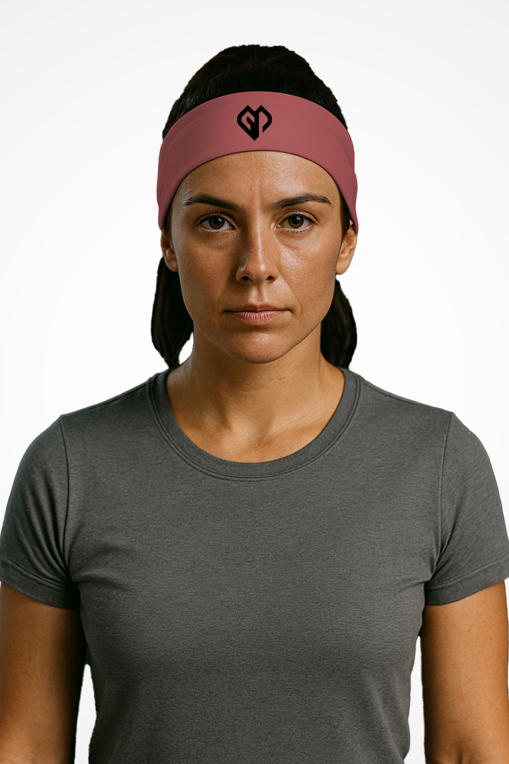 Hippie pink Gymplode headband with icon logo, worn by female model
