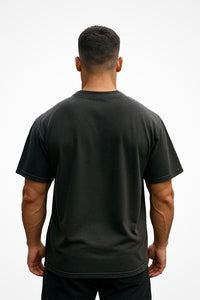 Mens Oversized Faded Gymplode t-shirt with no print, back view with model