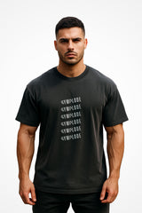 Mens Oversized Faded Gymplode t-shirt with stacked logo, front view with model
