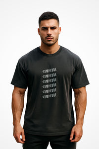 Mens Oversized Faded Gymplode t-shirt with stacked logo, front view with model