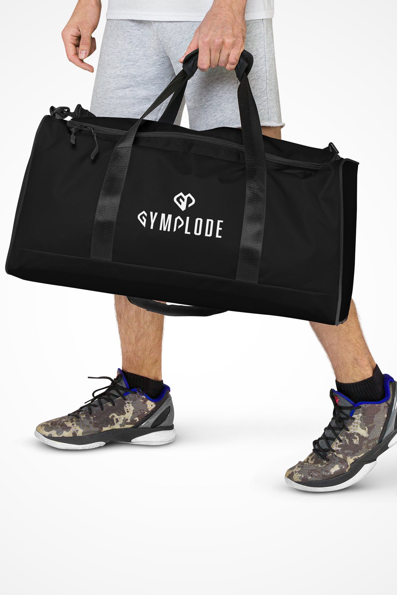 Midnight black square end Gymplode duffle bag with dual mark, front view with model