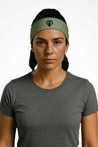 Moss green Gymplode headband with icon logo, worn by female model