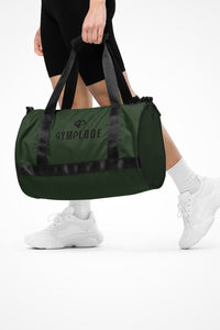 Night green rounded end Gymplode duffle bag with dual mark, front view with model