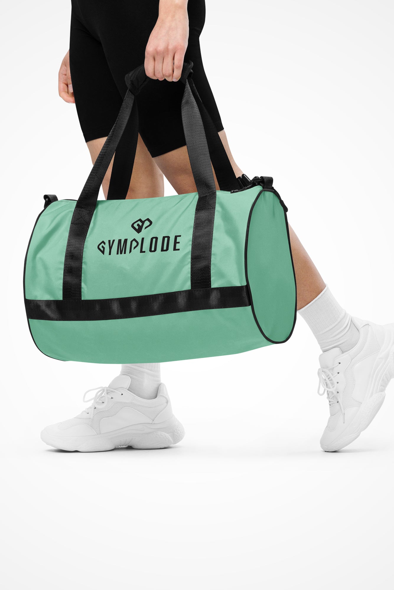 Ocean teal rounded end Gymplode duffle bag with dual mark, front view with model