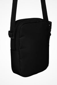 Onyx black Gymplode slingback utility bag with no print, back view