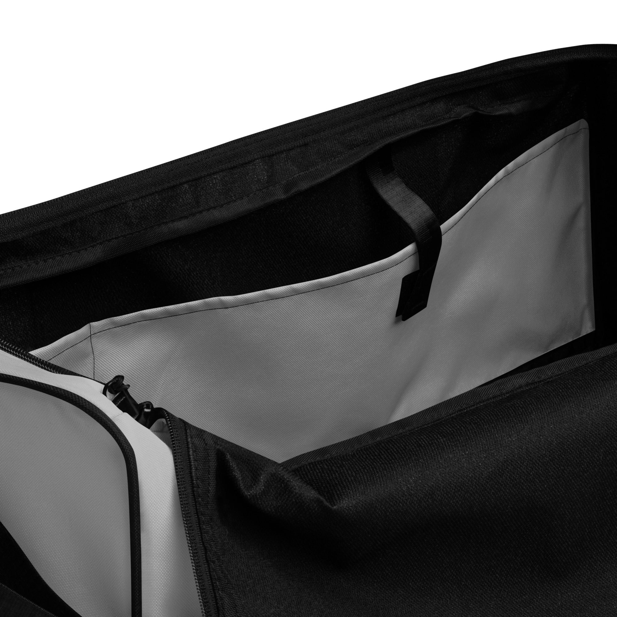 Pale grey square end Gymplode duffle bag with no print, inside pocket view