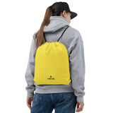 Paris daisy lightweight drawstring bag with Gymplode dual mark imprint worn as backpack by female model