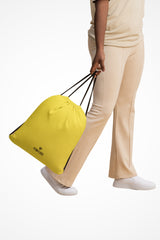 Paris daisy lightweight drawstring bag with Gymplode dual mark imprint, front view with model