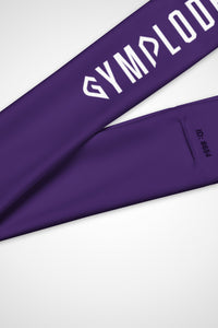 Close up view of Gymplode signature logo on purple headband