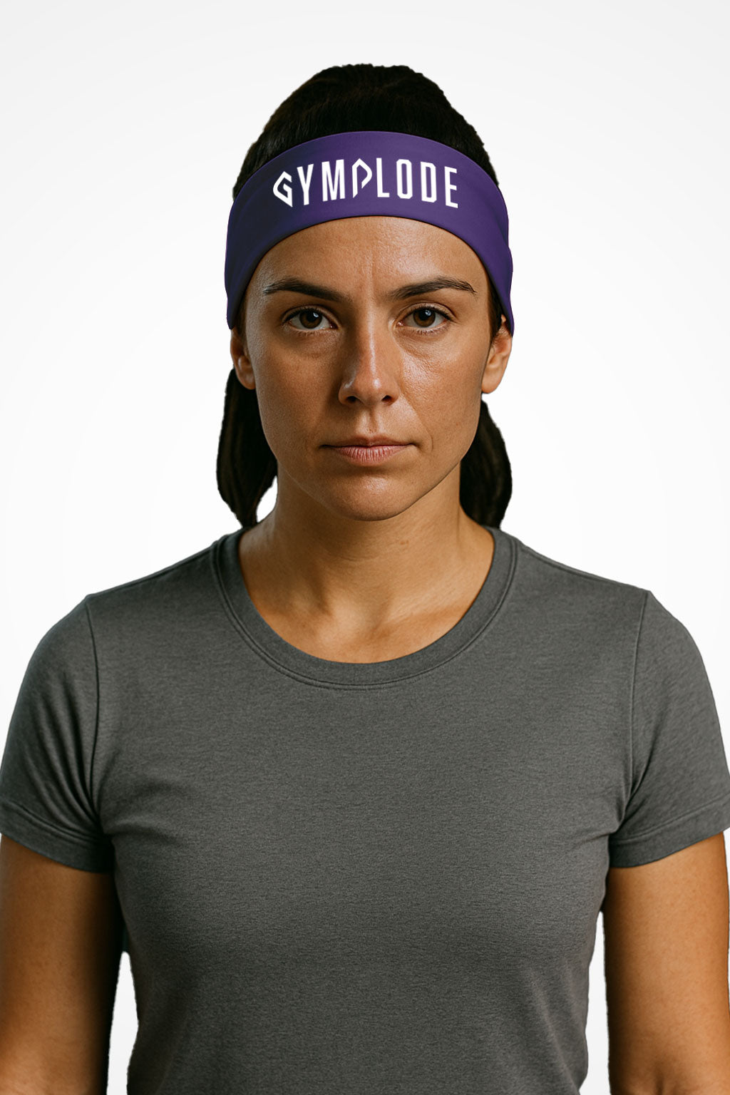 Purple Gymplode headband with signature logo, worn by female model