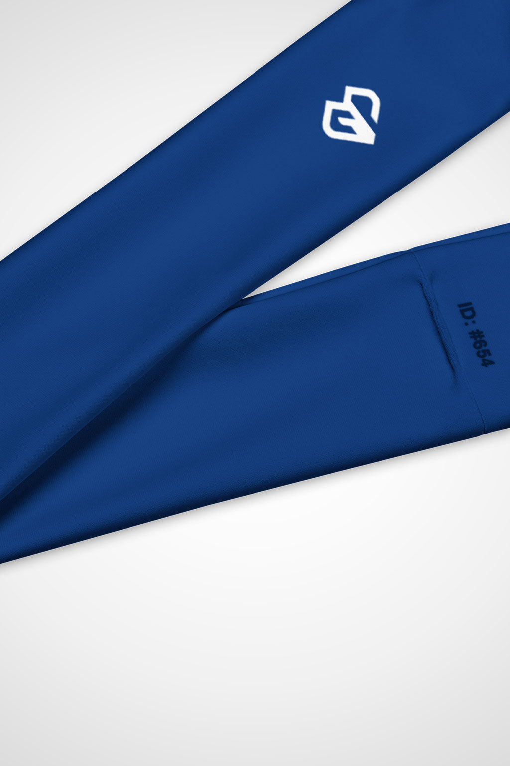 Close up view of Gymplode icon imprint logo on Regal blue headband