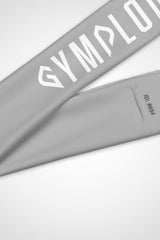 Close up view of Gymplode signature logo on silver headband