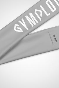 Close up view of Gymplode signature logo on silver headband