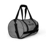 Smoke grey rounded end Gymplode duffle bag with dual mark, right front view