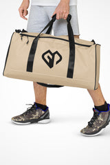 Soft beige square end Gymplode duffle bag with icon logo, front view with model