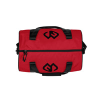 Sunset red rounded end Gymplode duffle bag with icon logo on both sides, top view