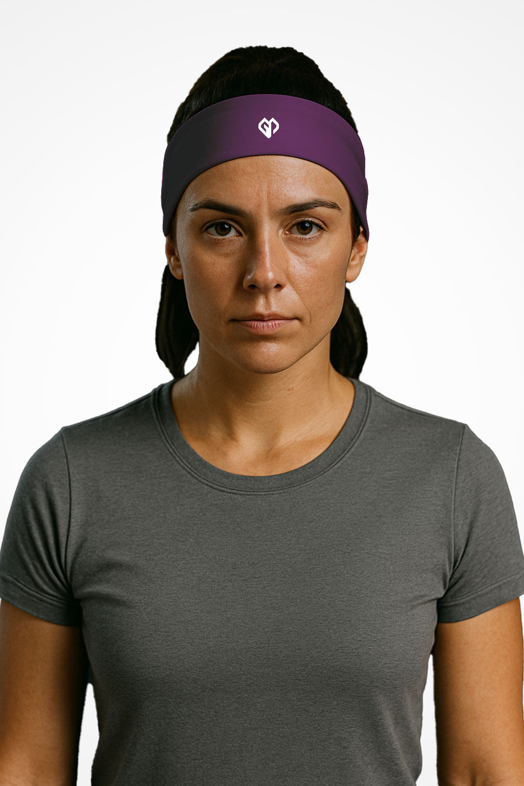 Tyrian purple Gymplode headband with icon logo, worn by female model