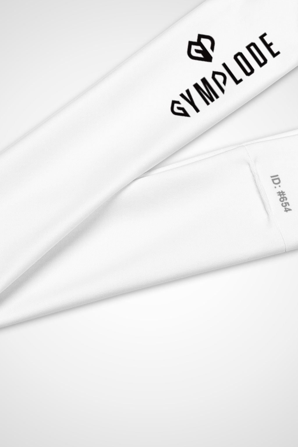 Close-up view of Gymplode dual mark imprint logo on white headband