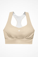 Womens beige longline sports bra with Gymplode icon logo, front view