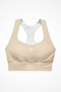 Womens beige longline sports bra with Gymplode icon logo, front view