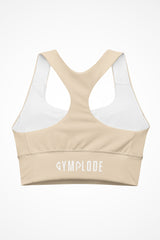Womens beige longline sports bra with Gymplode signature logo, back view