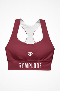 Womens burgundy longline sports bra with Gymplode dual mark logo, front view