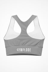 Womens cool grey longline sports bra with Gymplode signature logo, back view