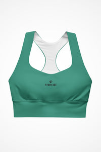 Womens elf green longline sports bra with Gymplode dual mark logo, front view