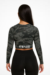 Womens Ashen long sleeve sports crop top with Gymplode sig logo, back view with model