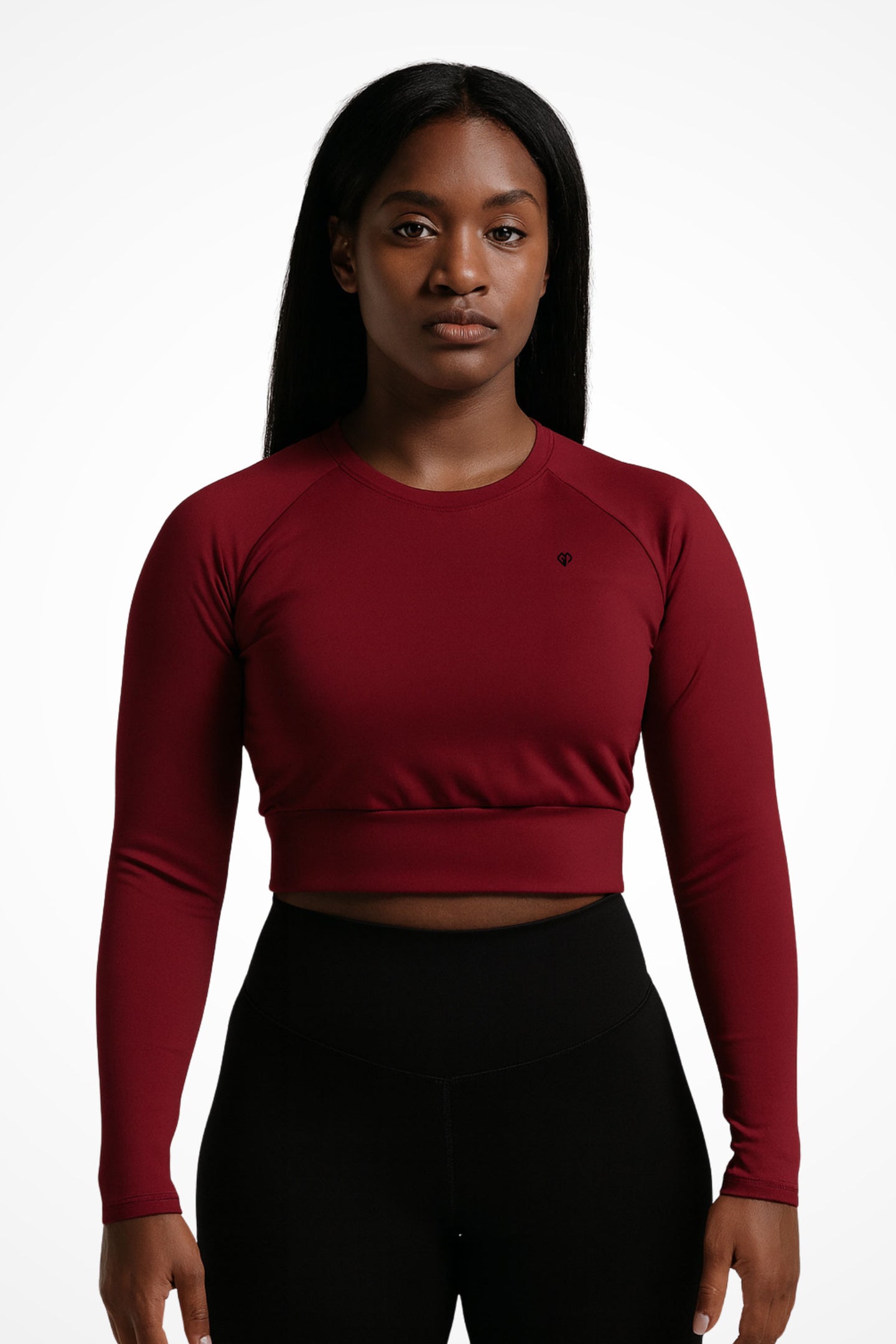 Womens Rouge long sleeve sports crop top with Gymplode icon logo, front view with model