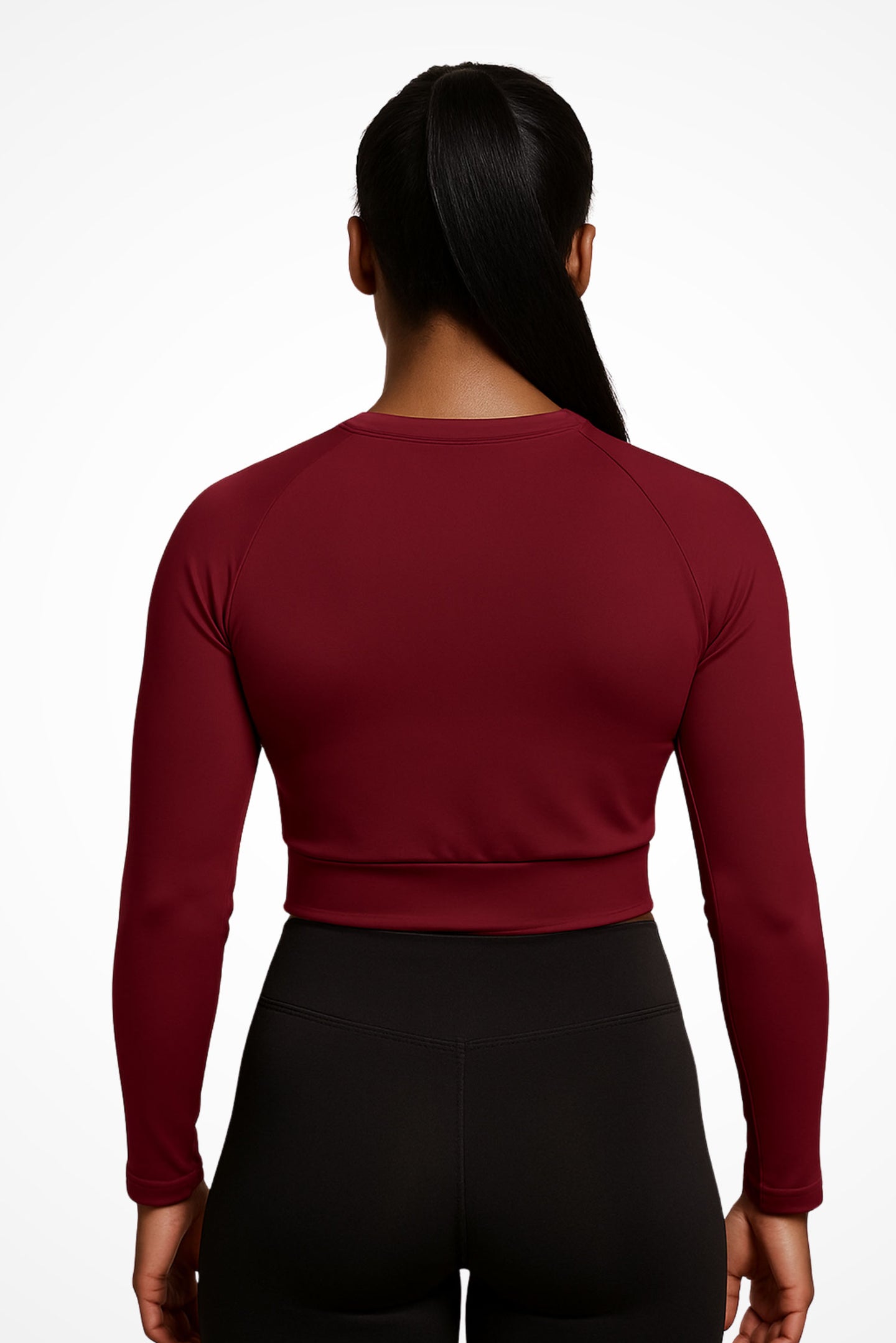 Womens Gymplode Rouge long sleeve sports crop top with no print, back view with model