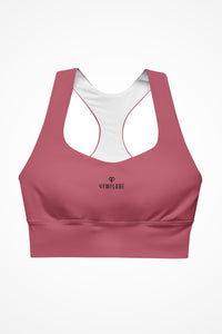 Womens hippie pink longline sports bra with Gymplode dual mark logo, front view